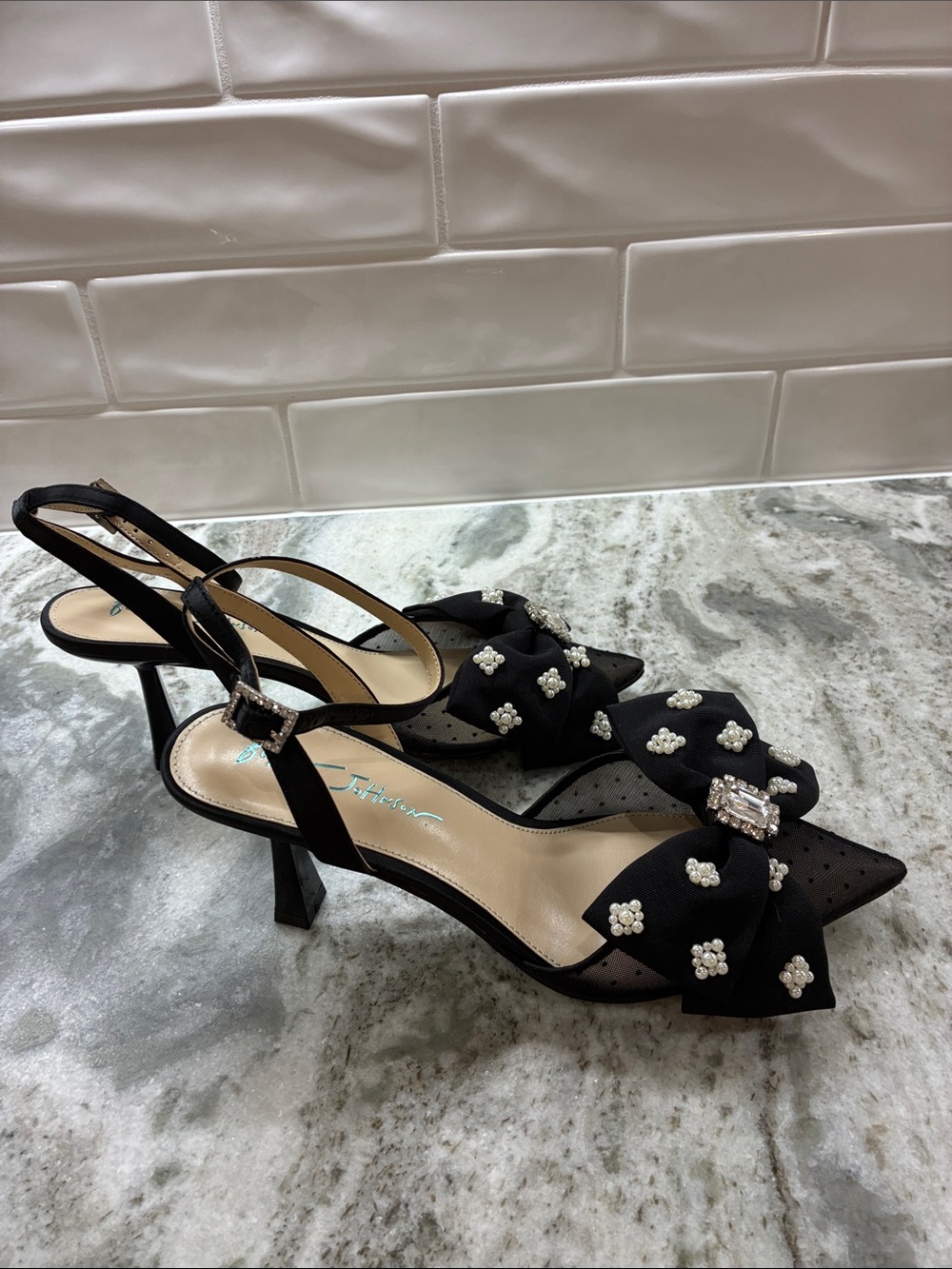 Embellished Black Slingback Heels with Bow Detail by Betsy Johnson.